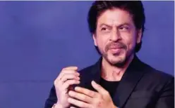  ?? Agence France-presse ?? Shah Rukh Khan gestures during a media event of his Hindi-language film ‘Pathaan’ in Mumbai.