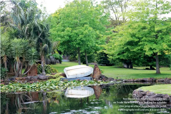  ??  ?? Susi found this dinghy many years ago on Trade Me when she was looking for a shabby chic prop as a focal point beside the pond. It photograph­s well and yes, it is seaworthy.