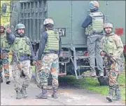  ?? ANI PHOTO ?? Security personnel patrol the area where an encounter broke out between security forces and terrorists at Andwan Sagam in Anantnag on Sunday.