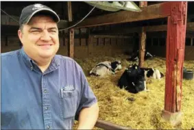  ??  ?? Jeff King manages the genetics program at Kings Ransom Farm in Northumber­land.