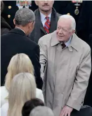  ??  ?? Barack Obama saúda o ex-presidente Jimmy Carter