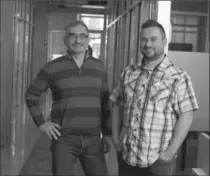  ?? PETER LEE, RECORD STAFF ?? Victor Leipnik, right, took his father, Alex, on a tour of his office space in the Breithaupt Block in Kitchener. Alex worked in the building when it was a factory making auto parts.