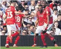  ??  ?? GRABBED Forest’s Lewis Grabban celebrates his first goal