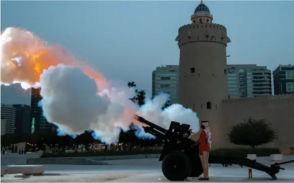  ?? Victor Besa / The National ?? A cannon is fired at Qasr Al Hosn in Abu Dhabi yesterday, the last day of Ramadan, to mark the end of the day’s fast