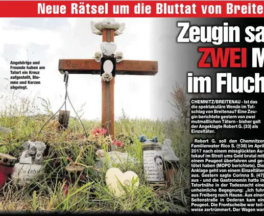  ??  ?? Angehörige und Freunde haben am Tatort ein Kreuz aufgestell­t, Blumen und Kerzen abgelegt.
