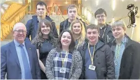  ??  ?? Visit Mr Crawford showing Stirling University students around the Scottish Parliament