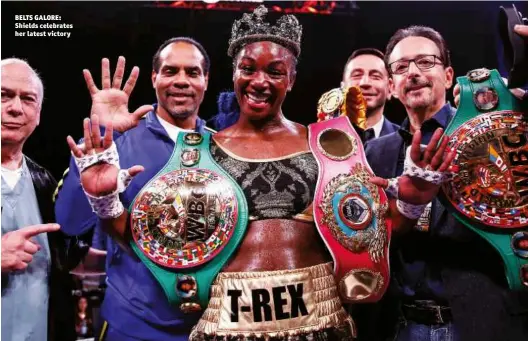  ?? Photos: STEPHANIE TRAPP/SHOWTIME ?? BELTS GALORE: Shields celebrates her latest victory