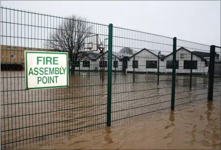  ?? Photo ?? Castleisla­nd Community College where the flood waters went to within a few inches on the door before receeding in January 2014.