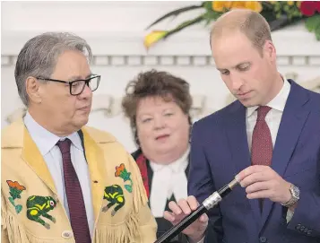  ?? — THE CANADIAN PRESS FILES ?? Grand Chief Ed John, left, with Prince William, the Duke of Cambridge, developed a passion for activism from his family and the people he met in school, which included six years at a residentia­l school at Fraser Lake.