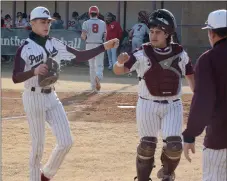  ?? Graham Thomas/Siloam Sunday ?? Siloam Springs senior pitcher Gavin Henson, left, and catcher J.P. Wills fist bump after Henson struck out three Vilonia batters in the first inning of Game 1 in Wednesday’s 5A-West Conference doublehead­er. Henson threw a shutout in Game 1 as the Panthers won 14-0 in five innings. Siloam Springs completed the sweep with a 7-1 win in Game 2.