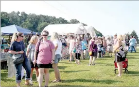  ??  ?? Thousands of people come to The Junk Ranch in Prairie Grove each year. The event is held in June and October and draws vendors from states that include Arkansas, Missouri, Texas and Oklahoma. The fall Junk Ranch will be Friday, Oct. 6 and Saturday,...