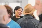  ?? H John Voorhees III/Hearst Connecticu­t Media ?? Mendi Blue Paca, CEO of Fairfield County Community Foundation talks with attendees of the kickoff event for the 24-hour Giving Day held by the foundation. Held at the Norwalk Art Space on Thursday.