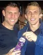  ??  ?? Funny side: Milner with a bottle of Ribena and former Liverpool player Stephen Warnock last night