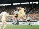  ??  ?? Gordon McQueen, pictured heading the ball for Leeds against Coventry in 1976, was revered for his bravery in the air. Photograph: Colorsport/Shuttersto­ck