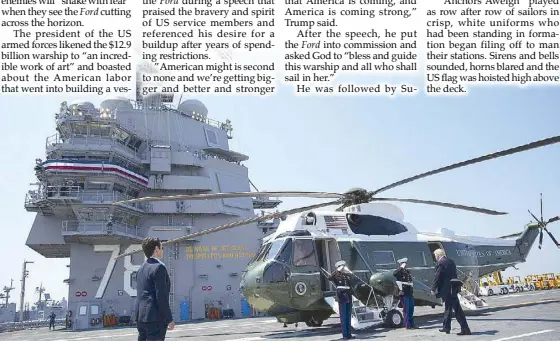  ?? AP ?? US President Donald Trump walks to board Marine One on the flight deck of the USS Gerald Ford in Virginia after the commission­ing ceremony of the aircraft carrier on Saturday.