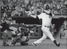  ?? DAVID J. PHILLIP/AP PHOTO ?? Chase Headley of the Yankees doubles in Game 5 of the ALCS against the Astros on Oct. 18 at New York.