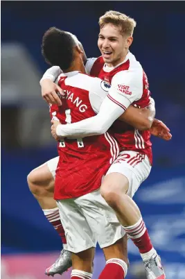  ?? Picture: AFP ?? GOOD TIMES. Arsenal’s Emile Smith Rowe (right) celebrates after scoring a goal with team-mate Pierre-Emerick Aubameyang during their English Premier League at Stamford Bridge on Wednesday night.