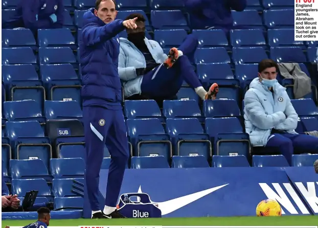  ??  ?? SITTING IT OUT England youngsters James, Abraham and Mount look on as Tuchel gives out orders