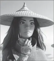  ??  ?? Imagen cedida por Disney en la que aparece la princesa Raya, durante una escena de la película de animación “Raya And The Last Dragon”