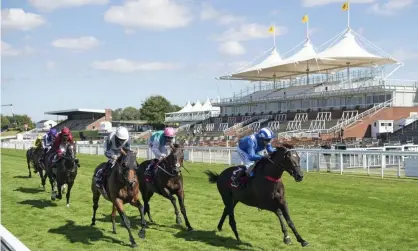  ?? Photograph: REX/Shuttersto­ck ?? Mohaather (right) gets up late to win the Sussex Stakes.