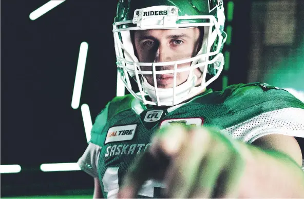  ??  ?? Saskatchew­an QB Zach Collaros says he’s always felt the Roughrider­s had the best jerseys in the CFL. Now that he’s modelled his new jersey, he says he “can’t wait for camp.”
