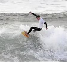  ??  ?? Local surfer Colin O’Hare at Strandhill.