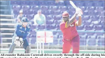  ?? WICB Media) (Photo courtesy ?? All-rounder Rahkeem Cornwall drives sweetly through the off-side during his 59 against England in the 50-overs tour match at Warner Park.