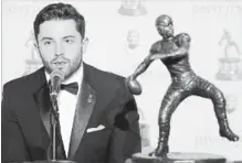  ?? MAX FAULKNER THE ASSOCIATED PRESS ?? Davey O’Brien National Quarterbac­k Award winner Baker Mayfield speaks during a news conference at the Fort Worth Club in Fort Worth, Texas, on Monday.