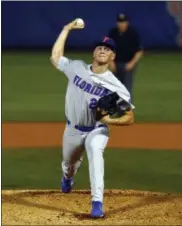  ?? BUTCH DILL — THE ASSOCIATED PRESS ?? Florida pitcher Jack Leftwich throws during the first inning against LSU on May 25 in Hoover, Ala.