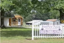  ??  ?? Bonnie Yates’ PawPaw Patch Grooming sits at the corner of U.S. Highway 259 and Farm to Market Road 44, two miles south of the bridge over Texas Highway 82 in DeKalb.