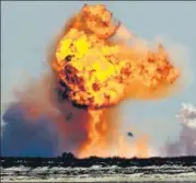  ?? AP ?? The Spacex Starship prototype explodes after crashing while trying to land after a test launch in Boca Chica, Texas, US.
