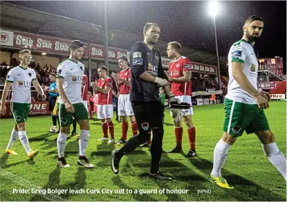  ??  ?? Pride: Greg Bolger leads Cork City out to a guard of honour