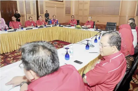  ??  ?? Discussing challenges: Zahid and Khaled attending the closed-door meeting with the Johor umno liason committee members in Johor Baru.