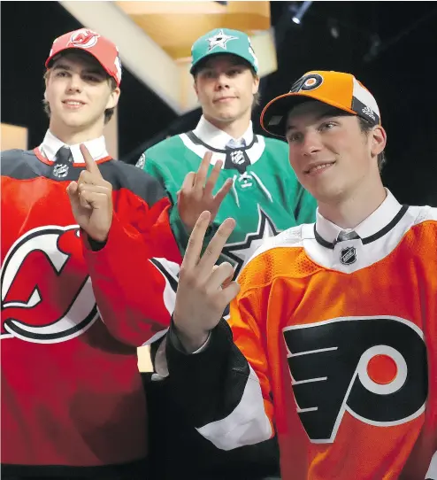  ?? BRUCE BENNETT / GETTY IMAGES ?? From left, the top three picks in Friday’s NHL entry draft Nico Hischier (No. 1), Miro Heiskanen (No. 3) and Nolan Patrick (No. 2) are introduced sporting their respective jerseys at Chicago’s United Center.