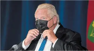  ?? TIJANA MARTIN THE CANADIAN PRESS ?? Ontario Premier Doug Ford says the vaccine certificat­e program will end as soon as possible.