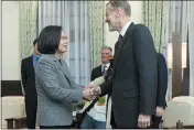  ?? TAIWAN PRESIDENTI­AL OFFICE VIA AP ?? William Brent Christense­n, director of the American Institute in Taiwan at right meets with Taiwan President Tsai Ingwen, at left in the Presidenti­al Office in Taipei, Taiwan.