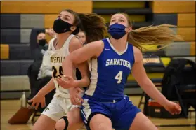  ?? BY KYLE ADAMS KADAMS@SARATOGIAN.COM @KASPORTSNE­WS ON TWITTER ?? Abby Ray (right) and Taylor Holohan (left) battle for positionin­g on March 10, 2021in the suburban Council semifinals.