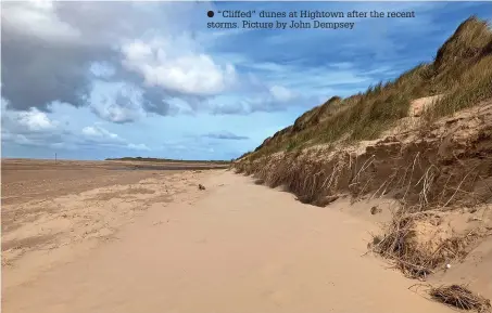  ?? ?? “Cliffed” dunes at Hightown after the recent storms. Picture by John Dempsey