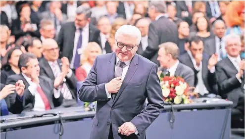  ?? FOTO: DPA ?? Der neue Bundespräs­ident Frank-Walter Steinmeier (SPD) geht im Reichstag in Berlin nach seiner Wahl zum Rednerpult.