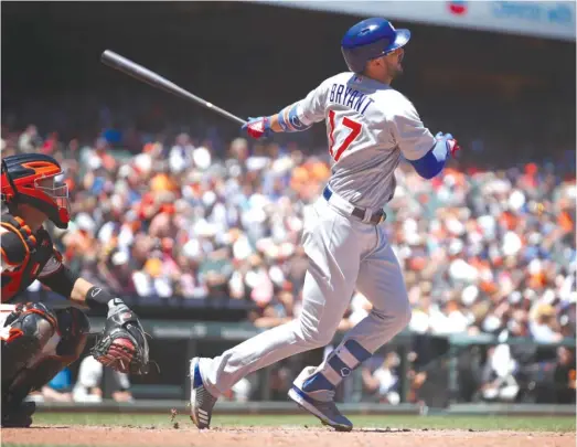  ?? AP ?? Kris Bryant, who was out since June 23 with inflammati­on in his left shoulder, hit his 10th home run in the fifth inning and walked twice Wednesday against the Giants.