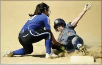  ?? BILL UHRICH — MEDIANEWS GROUP ?? Upper Perkiomen’s Darby Gasda is safe at third on a close play with Exeter’s Sasha Bolonski in the fourth inning in a state softball playoff game at Exeter on Monday, June 6.