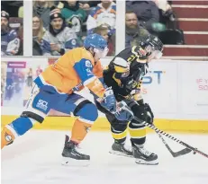  ?? PHOTOS: TOM SCOTT ?? Phantoms’ Taylor Romeo (left) in action against Bracknell