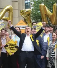  ?? Picture: Gordon Terris ?? Leader Alex Cole-hamilton and Scottish Liberal Democrats supporters celebrate in Edinburgh after seeing the party’s number of councillor­s double to 12