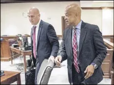  ?? JOHN AMIS / SPECIAL ?? DeKalb Sheriff Jeff Mann (right) and attorney Noah Pines arrive for a hearing to plead not guilty June 2 in Atlanta Municipal Court. Mann was arrested and charged in Piedmont Park on May 6 for allegedly exposing himself and running from police.