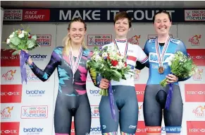  ??  ?? Katie, right, after her third-place finish in the time trial, with second-placed Hannah Barnes and winner Claire Rose