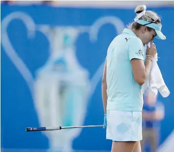  ??  ?? Lexi Thompson composes herself during the final round of the LPGA Tour’s ANA Inspiratio­n tournament earlier this year. Thompson was given a four-shot penalty after a TV viewer noticed a rules violation. Golf’s ruling bodies issued a new guideline...