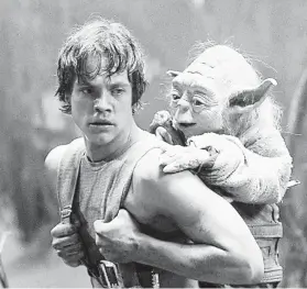  ?? Lucasfilm Ltd. ?? Mark Hamill as Luke Skywalker and the character Yoda appear in a scene from “Star Wars Episode V: The Empire Strikes Back.”