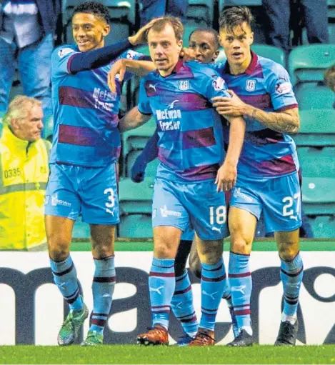  ?? Picture: SNS. ?? Dundee goal hero Paul McGowan celebrates with Nathan Ralph, Glen Kamara and Jesse Curran.
