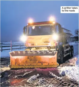  ??  ?? A gritter takes to the roads