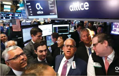  ?? (Lucas Jackson/Reuters) ?? TRADERS WORK on the floor of the New York Stock Exchange yesterday. Health care, up 1.5%, was the best-performing group on Wall Street as Senate Republican­s unveiled a draft bill to replace the Affordable Care Act.